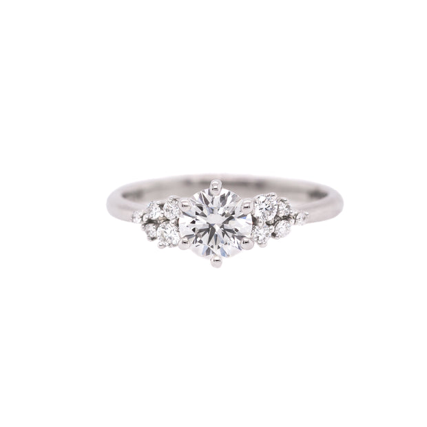 14K White Gold 0.80ct Round Diamond Engagement Ring with 0.16ct Cluster Accent Side Stones. Bichsel Jewelry in Sedalia, MO. Shop ring styles online or in-store today!