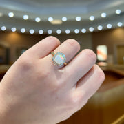 14K Yellow Gold 1.40ct Cushion Cut Opal Ring with Diamond Ballerina Halo. Bichsel Jewelry in Sedalia, MO. Shop gemstone rings online or in-store today!