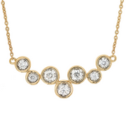14K Yellow Gold Bezel-Set 0.50ct Round Diamond Cluster Necklace. Bichsel Jewelry in Sedalia, MO. Shop pendant styles online or in-store today! 