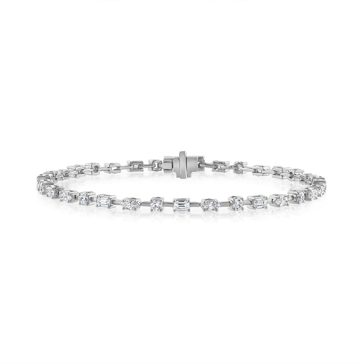 14K White Gold Mixed Shape 2.44ct Diamond Tennis Bracelet with Round, Oval, Baguette Diamonds. Bichsel Jewelry in Sedalia, MO. Shop diamond styles online or in-store today! 