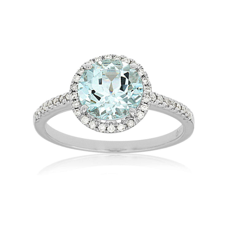 14K White Gold 1.75ct Aquamarine Ring with Diamond Halo. Bichsel Jewelry in Sedalia, MO. Shop gemstone rings online or in-store today! Free ring sizing.