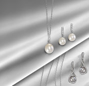 Diamond-Accented Silver Pearl Drop Dangle Pendant. Bichsel Jewelry in Sedalia, MO. Shop pearl styles online or in-store today!