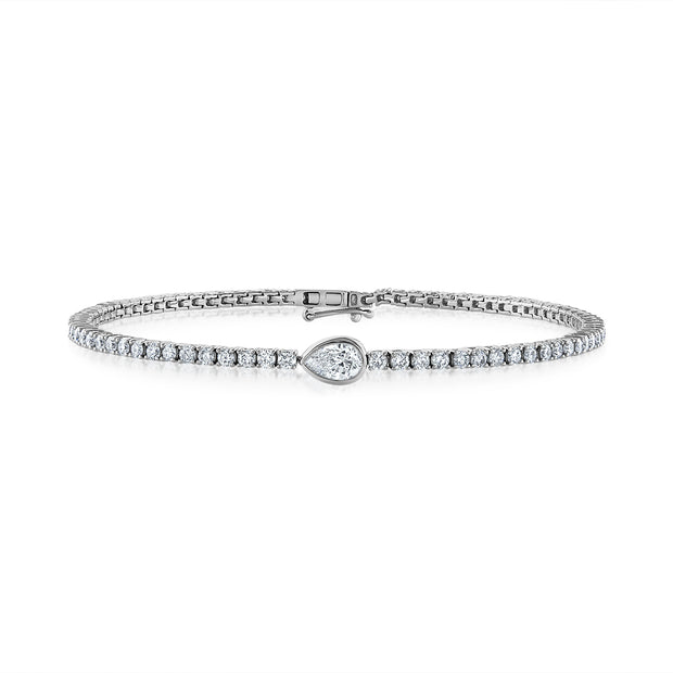 14K White Gold 2.03ct Round Diamond Tennis Bracelet with Bezel-Set Pear Shape Center Diamond. Bichsel Jewelry in Sedalia, MO. Shop diamond styles online or in-store today! 