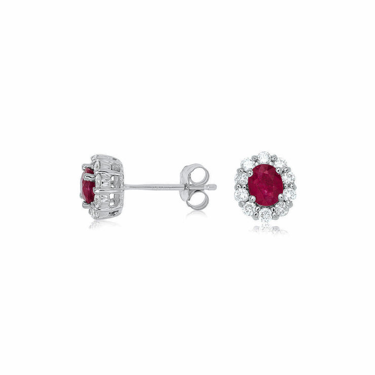 14K White Gold 0.80ct Oval Ruby Studs with Round Diamond Halos. Bichsel Jewelry in Sedalia, MO. Shop gemstone earrings online or in-store today!