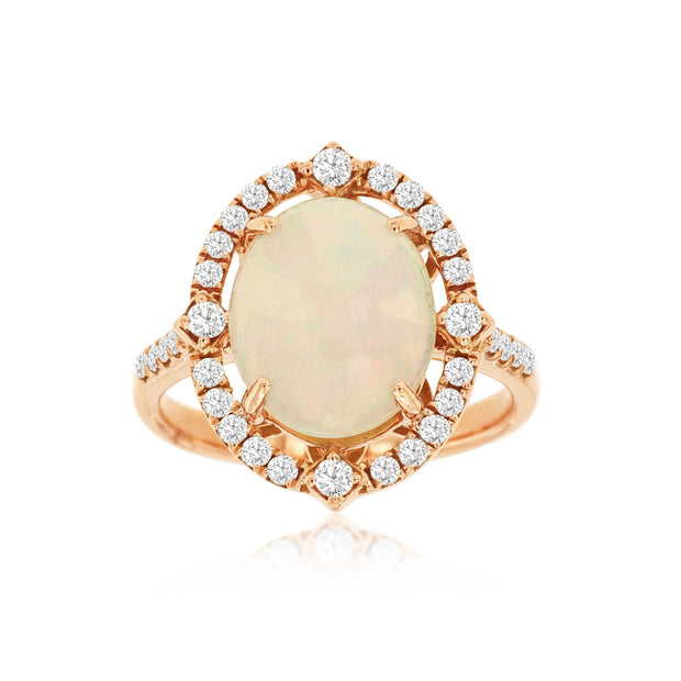 14K Rose Gold 3.00ct Oval Opal Ring with Diamond Halo. Bichsel Jewelry in Sedalia, MO. Shop gemstone rings online or in-store today! 