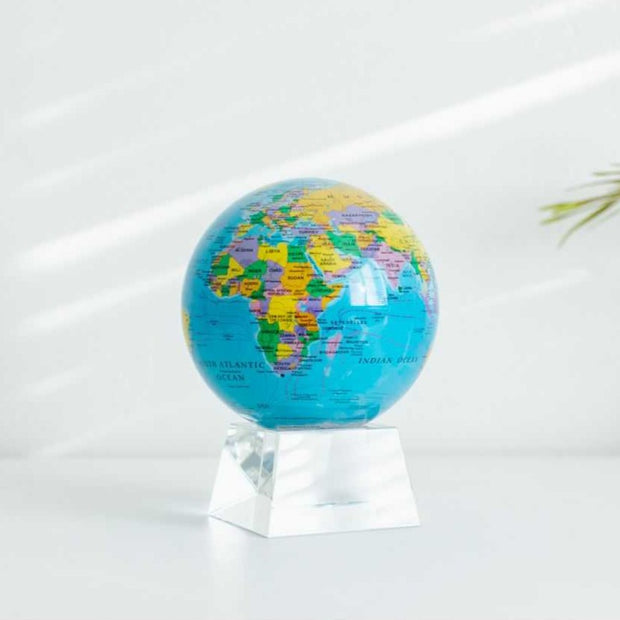 Blue Political World Map MOVA 4.5" Globe with Acrylic Base. Powered by Solar Ambient Light & Magnets. No cords or batteries needed. Shop online or in-store today!