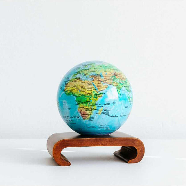 Blue Relief World Map 4.5" Globe with Acrylic Base. Powered by Solar Ambient Light & Magnets. No cords or batteries needed. Shop online or in-store today! Bichsel Jewelry | Sedalia, MO