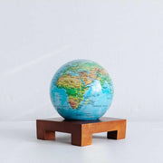 Blue Relief World Map 4.5" Globe with Acrylic Base. Powered by Solar Ambient Light & Magnets. No cords or batteries needed. Shop online or in-store today! Bichsel Jewelry | Sedalia, MO