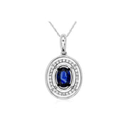 14K White Gold Oval 0.65ct Blue Sapphire Necklace with Round Diamond Halo. Bichsel Jewelry in Sedalia, MO. Shop gemstone styles online or in-store today! 