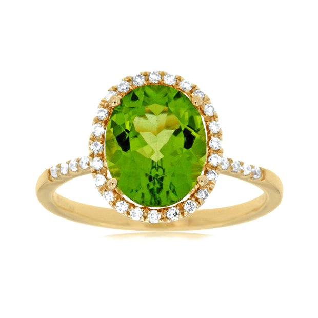 14K Yellow Gold 2.25ct Oval Peridot Ring with Diamond Halo & Side Diamonds. Bichsel Jewelry in Sedalia, MO. Shop gemstone rings online or in-store today!