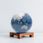 6" Sky Blue and White MOVA Globe with Acrylic Base. Powered by Solar Ambient Light & Magnets. No cords or batteries needed. Shop online or in-store today!