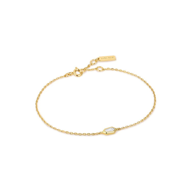 Ania Haie Gold Sparkle Emblem Dainty Chain Bracelet. 14K Yellow Gold plated on 925 Sterling Silver with CZ Stone. Bichsel Jewelry in Sedalia, MO. Shop online or in-store today!