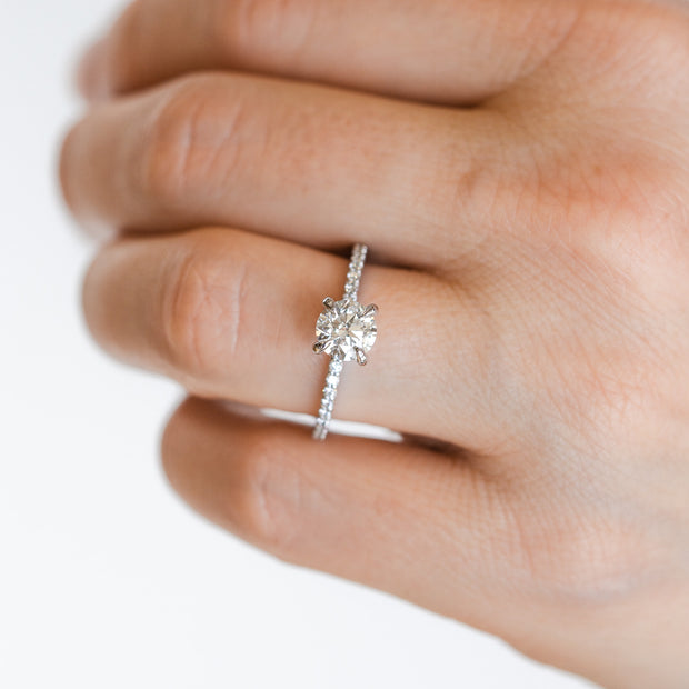 14K White Gold 1ct Round Diamond Engagement Ring with Side Accent Diamonds. Bichsel Jewelry in Sedalia, MO. Shop styles online or in-store today!