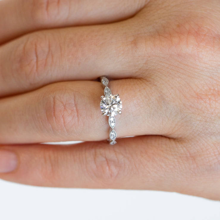 Round Diamond Engagement Ring with Marquise Shape Band