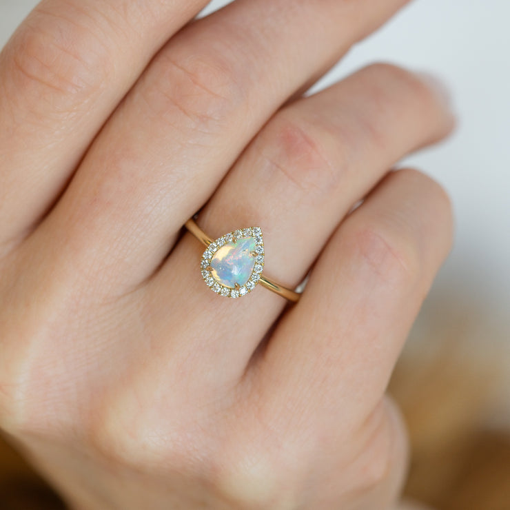 Opal ring with diamonds around it deals