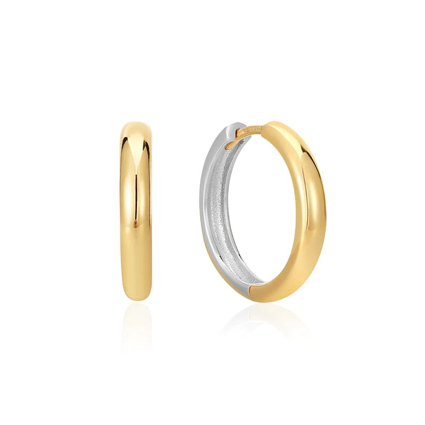 Ania Haie Two-Tone Hoops 925 Sterling Silver & 14K Yellow Gold Plated Hoop Earrings. Bichsel Jewelry in Sedalia, MO. Shop earrings online or in-store today!