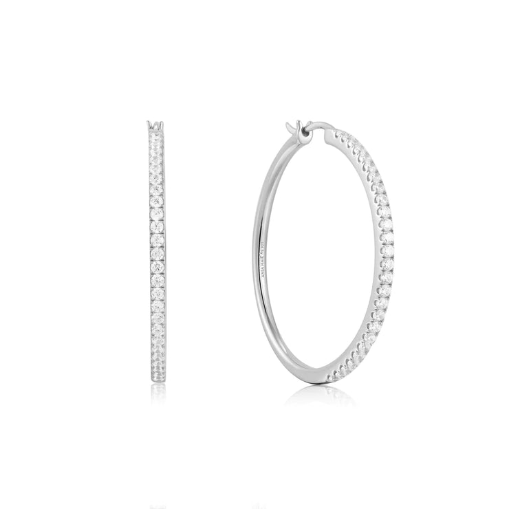 Ania Haie Silver Pavé Hoop Earrings. Rhodium plated 925 sterling silver with Cubic Zirconia stones. Bichsel Jewelry in Sedalia, MO. Shop styles online or in-store today! 