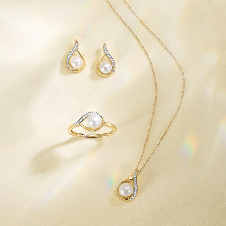 14K Yellow Gold 2ct Pearl Swirl Stud Earrings with Diamond Accents. Bichsel Jewelry in Sedalia, MO. Shop pearl styles online or in-store today!