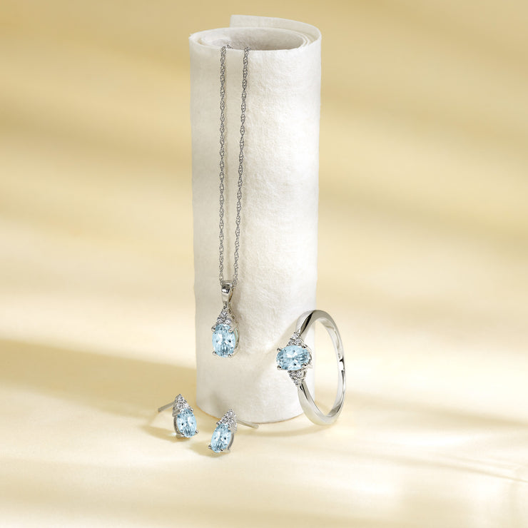 10K White Gold Oval 0.50ct Blue Topaz Stud Earrings with Round Diamond Accents. Bichsel Jewelry in Sedalia, MO. Shop online or in-store today!