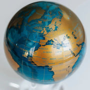 6" Blue & Gold MOVA World Map Moving Globe with Acrylic Base. Powered by Solar Ambient Light & Magnets. No cords or batteries needed. Shop online or in-store today! Bichsel Jewelry | Sedalia, MO