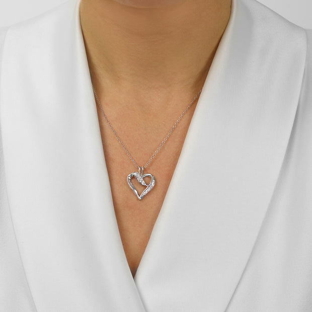 Sterling Silver Heart Shape Necklace with 0.02ct Round Diamonds. Bichsel Jewelry in Sedalia, MO. Shop styles online or in-store today!