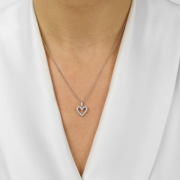 Sterling Silver 0.10ct Diamond Heart Necklace. Bichsel Jewelry in Sedalia, MO. Shop jewelry styles online or in-store today!
