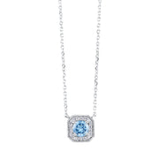 10K White Gold 0.60ct Round Blue Topaz Necklace with Art Deco-Inspired Square Diamond Halo. Bichsel Jewelry in Sedalia, MO. Shop online or in-store today!