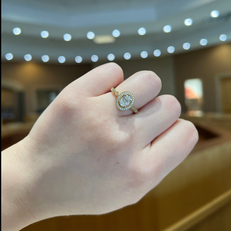 14K Yellow Gold Vintage-Inspired Oval Diamond Engagement Ring with Diamond Halo & Accent Stones. Bichsel Jewelry in Sedalia, MO. Shop online or in-store today!