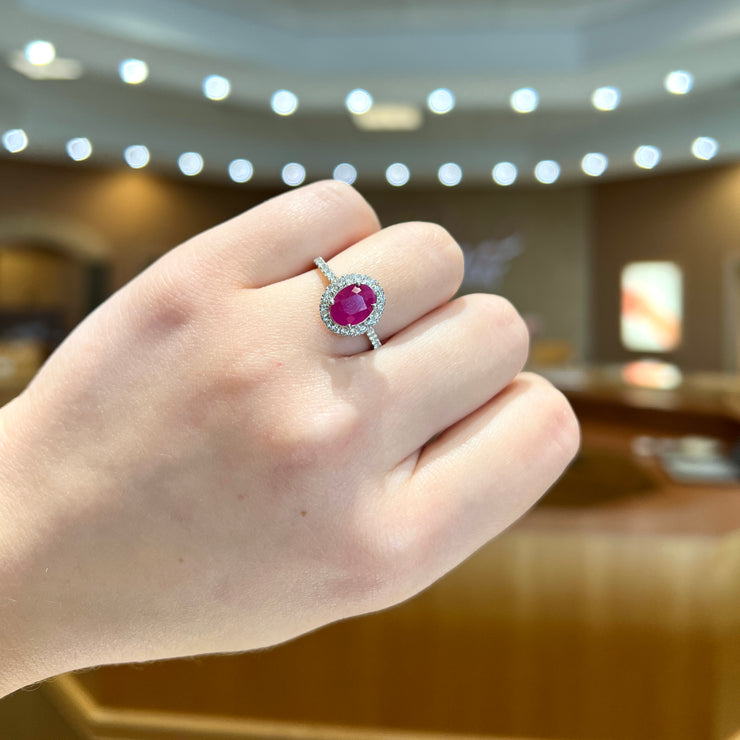 14K White Gold 1.20ct Oval Ruby Ring with 0.50ct Diamond Halo & Side Diamonds. Bichsel Jewelry in Sedalia, MO. Shop rings online or in-store today! Free ring sizing.