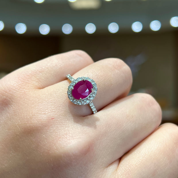 14K White Gold 1.20ct Oval Ruby Ring with 0.50ct Diamond Halo & Side Diamonds. Bichsel Jewelry in Sedalia, MO. Shop rings online or in-store today! Free ring sizing.