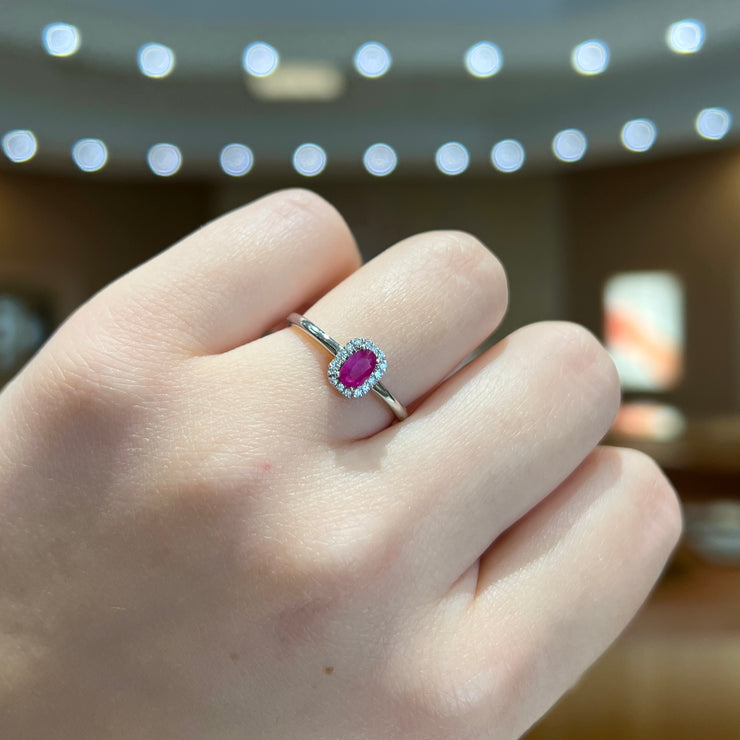 14K White Gold 0.25ct Oval Ruby Ring with Round Diamond Halo. Bichsel Jewelry in Sedalia, MO. Shop gemstone rings online or in-store today! Free ring sizing.