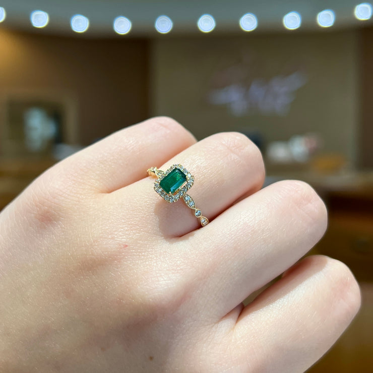 14K Yellow Gold 0.55ct Emerald Gemstone Ring with 0.26ct Diamond Halo & Accent Band. Bichsel Jewelry in Sedalia, MO. Shop rings online or in-store! Free ring sizing.