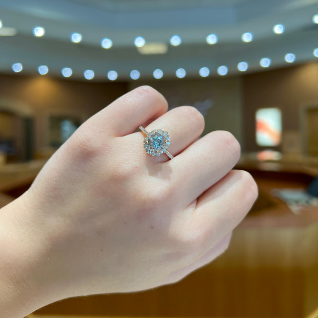 14K Rose Gold 1.15ct Round Aquamarine Ring with 0.49ct Diamond Halo. Bichsel Jewelry in Sedalia, MO. Shop gemstone rings online or in-store! Free ring sizing.