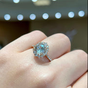 14K Rose Gold 1.15ct Round Aquamarine Ring with 0.49ct Diamond Halo. Bichsel Jewelry in Sedalia, MO. Shop gemstone rings online or in-store! Free ring sizing.