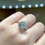 14K Rose Gold 1.15ct Round Aquamarine Ring with 0.49ct Diamond Halo. Bichsel Jewelry in Sedalia, MO. Shop gemstone rings online or in-store! Free ring sizing.