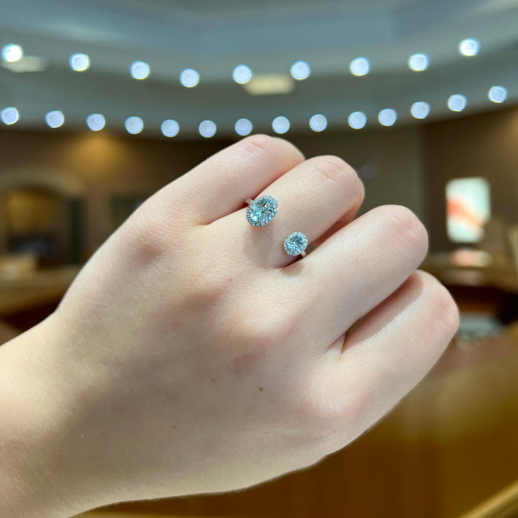 14K White Gold Open 0.55ct Oval Aquamarine Ring with Round Diamond Halos. Bichsel Jewelry in Sedalia, MO. Shop gemstone rings online or in-store! Free ring sizing.