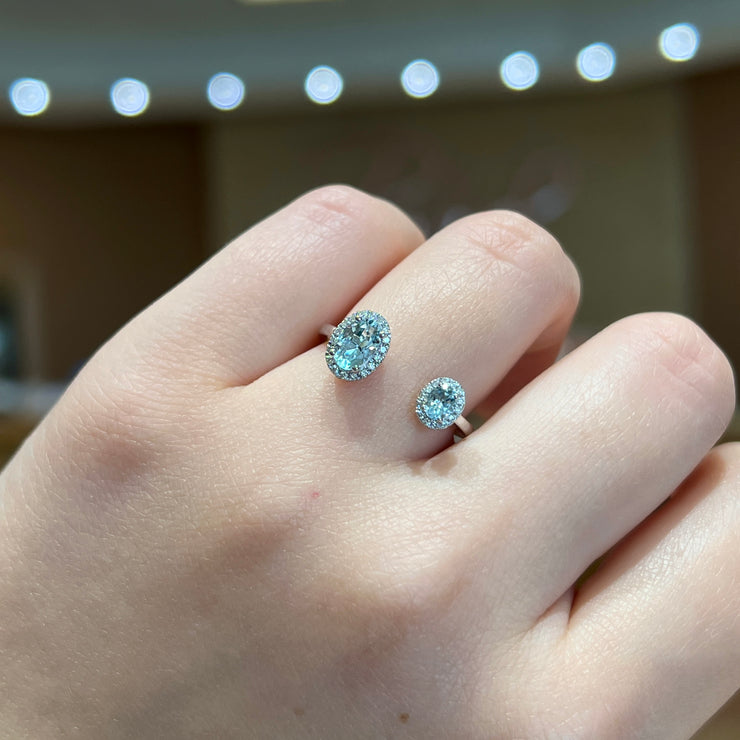 14K White Gold Open 0.55ct Oval Aquamarine Ring with Round Diamond Halos. Bichsel Jewelry in Sedalia, MO. Shop gemstone rings online or in-store! Free ring sizing.