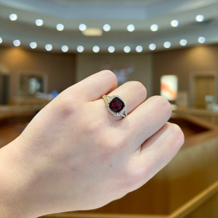 14K Yellow Gold Cushion Cut Garnet Split Shank Ring with Diamond Halo & Side Diamonds. Bichsel Jewelry in Sedalia, MO. Shop rings online or in-store! Free ring sizing.