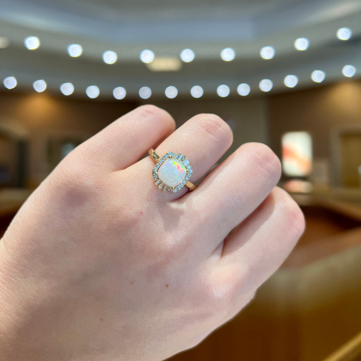 14K Yellow Gold 1.40ct Cushion Cut Opal Ring with Diamond Ballerina Halo. Bichsel Jewelry in Sedalia, MO. Shop gemstone rings online or in-store today!