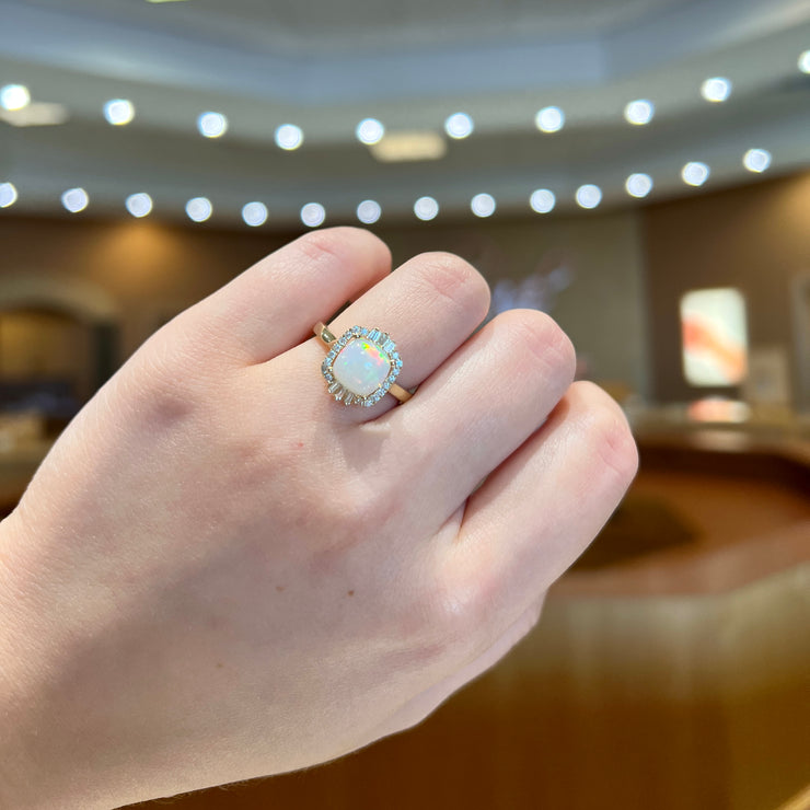 14K Yellow Gold 1.40ct Cushion Cut Opal Ring with Diamond Ballerina Halo. Bichsel Jewelry in Sedalia, MO. Shop gemstone rings online or in-store today!