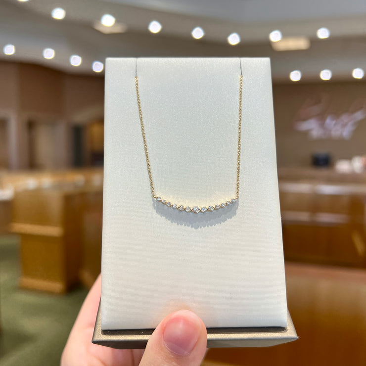 14K Yellow Gold 0.31ct Round Diamond Curved Bar Necklace. Bichsel Jewelry in Sedalia, MO. Shop pendant styles online or in-store today!