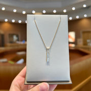 14K Yellow Gold Bar Necklace with 0.15ct Round & 0.28ct Baguette Diamonds. Bichsel Jewelry in Sedalia, MO. Shop styles online or in-store today!