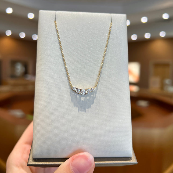 14K Yellow Gold 0.20ct Curved Necklace with 5 Round Diamonds. Bichsel Jewelry in Sedalia, MO. Shop pendant styles online or in-store today!