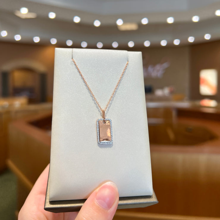 14K Rose Gold Tag Necklace with 0.16ct Round Diamond Halo. Bichsel Jewelry in Sedalia, MO. Shop gold and diamond necklaces online or in-store today!