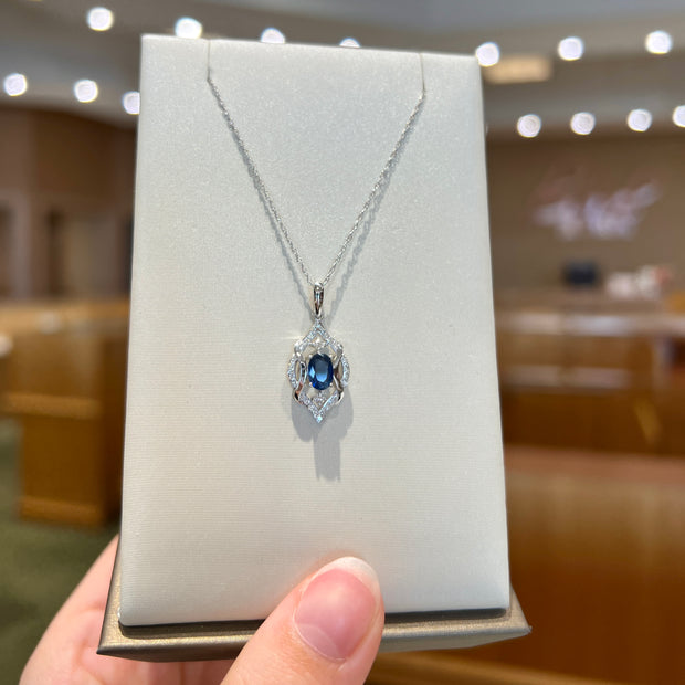 14K White Gold Vintage-Inspired Blue 0.58ct Oval Sapphire & Diamond Necklace. Bichsel Jewelry in Sedalia, MO. Shop styles online or in-store today!