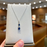 14K White Gold Necklace with 0.93ct Oval Blue Sapphire & Diamond Dangles. Bichsel Jewelry in Sedalia, MO. Shop gemstone styles online or in-store today!