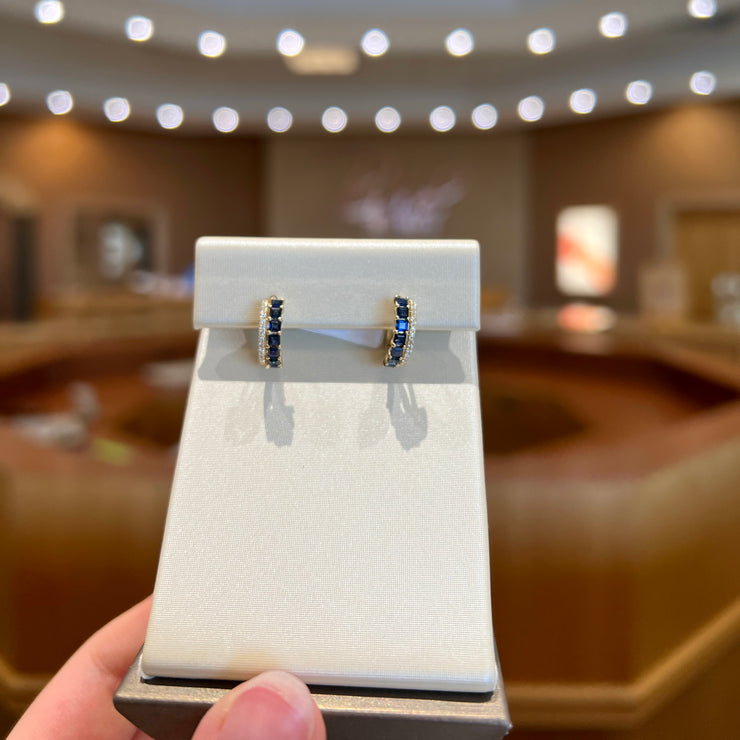 14K Yellow Gold Blue Sapphire & Diamond Huggie Hoop Earrings. Bichsel Jewelry in Sedalia, MO. Shop gemstone & diamond earrings online or in-store today!