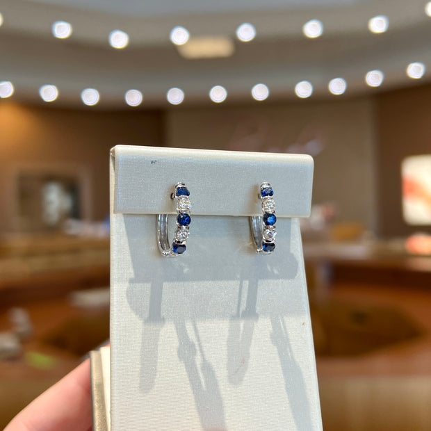 14K White Gold Alternating Round Sapphire & Diamond Hoops. Bichsel Jewelry in Sedalia, MO. Shop gemstone & diamond earrings online or in-store today!