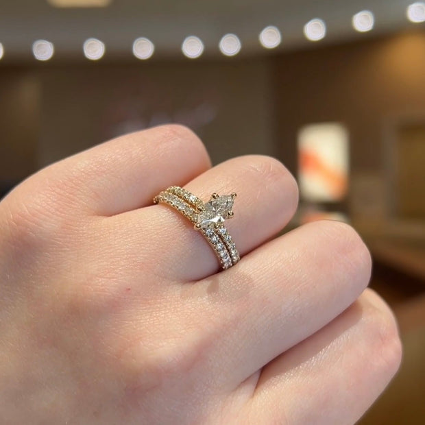 14K Yellow Gold 0.75ct Marquise Diamond Engagement Ring with 0.32ct Diamond Accent Band. Bichsel Jewelry in Sedalia, MO. Shop rings online or in-store today!