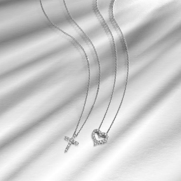 Sterling Silver 0.10ct Round Diamond Cross Necklace. Bichsel Jewelry in Sedalia, MO. Shop styles online or in-store today! 